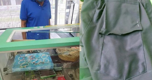 裕廊裁縫店“太深”，老人砸碎玻璃展示櫃