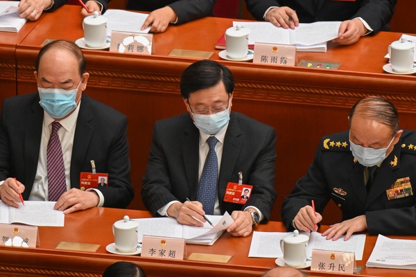 李家超北京列席人大會議開幕會