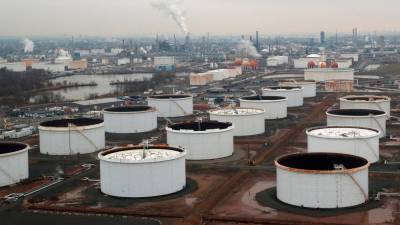 oil-prices-settle-lower-despite-record-us-crude-stock-drawdown