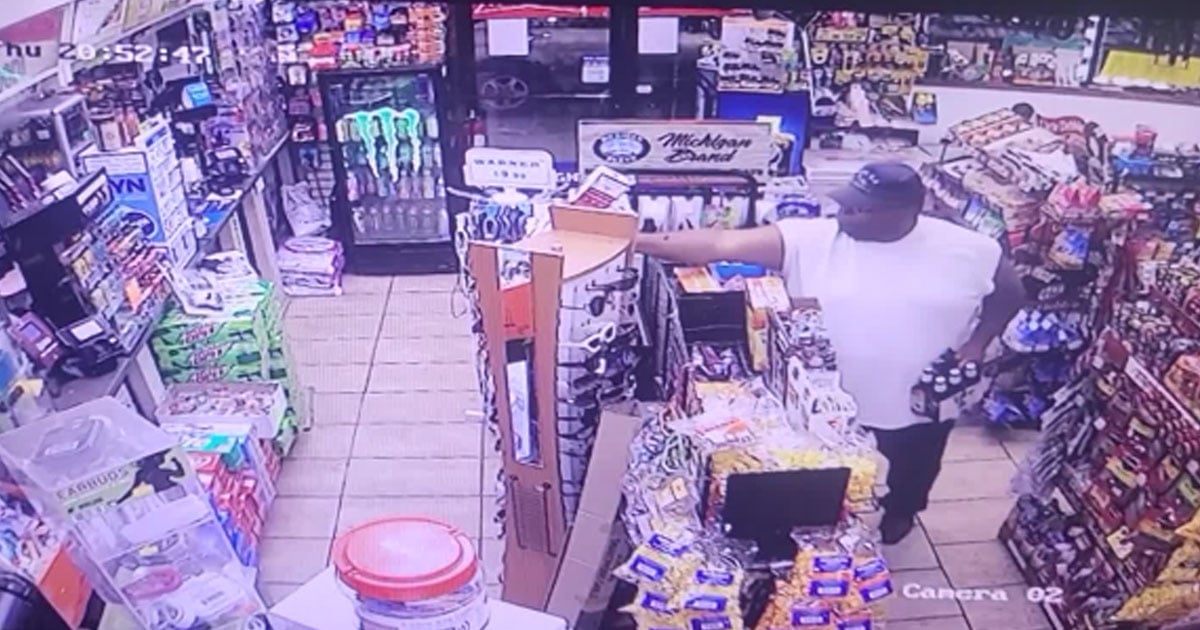 concealed-carrier-holding-6-pack-of-beer-shoots-armed-robber