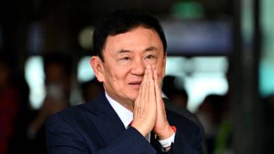 thai-king-cuts-ex-pm-thaksin’s-jail-term-to-one-year:-govt
