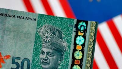 ringgit-opens-slightly-higher-on-mild-demand