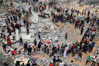 un-workers-across-asia-observe-moment-of-silence,-lower-flags-to-honour-fallen-colleagues-in-gaza