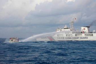 chinese-vessels-fire-water-cannon,-ram-philippine-ships