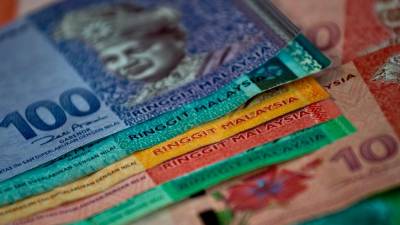 ringgit-opens-higher-against-us-dollar-amid-robust-us-bond-auction