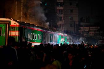trains,-polling-stations-face-arson-attacks-on-eve-of-bangladesh-elections