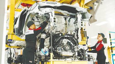 sime-darby,-porsche-expand-assembly-facility-in-kulim
